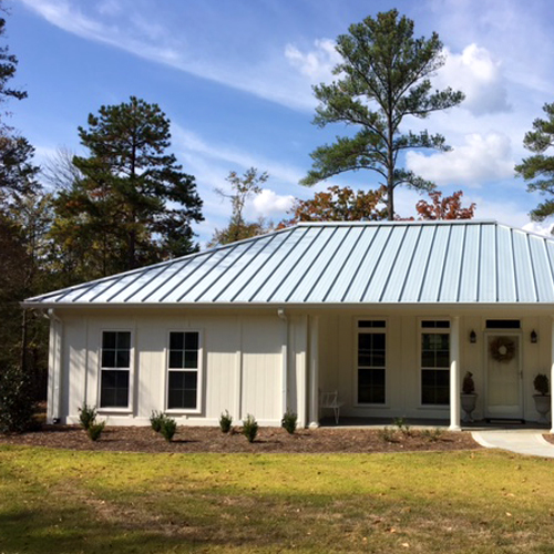 Reducing Peak Demand Costs with Cool Metal Roofs