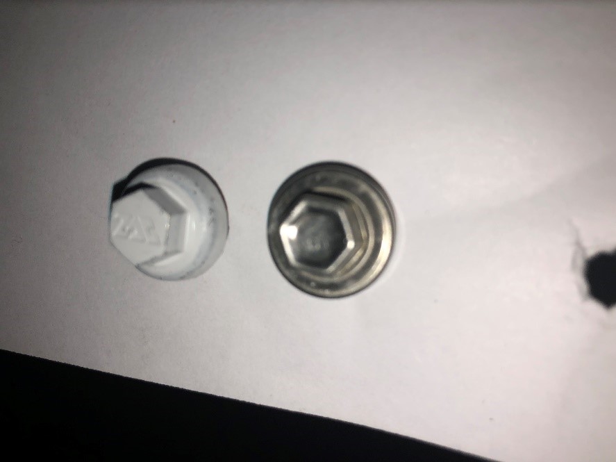 Long-life fasteners zinc/aluminum capped head (left) and stainless steel capped head (right).